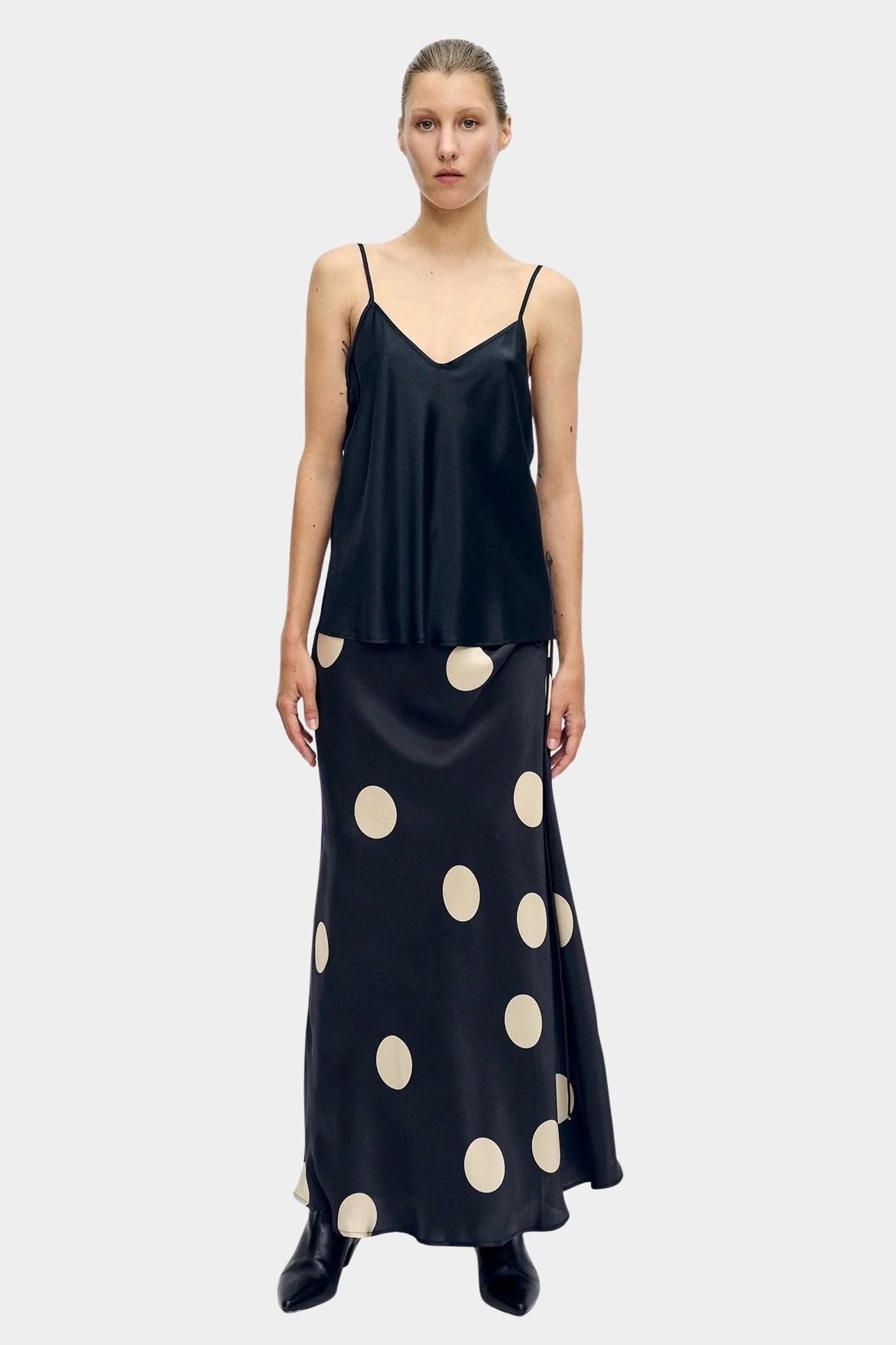 silk laundry long bias cut camisole black front view paired with polka dot skirt