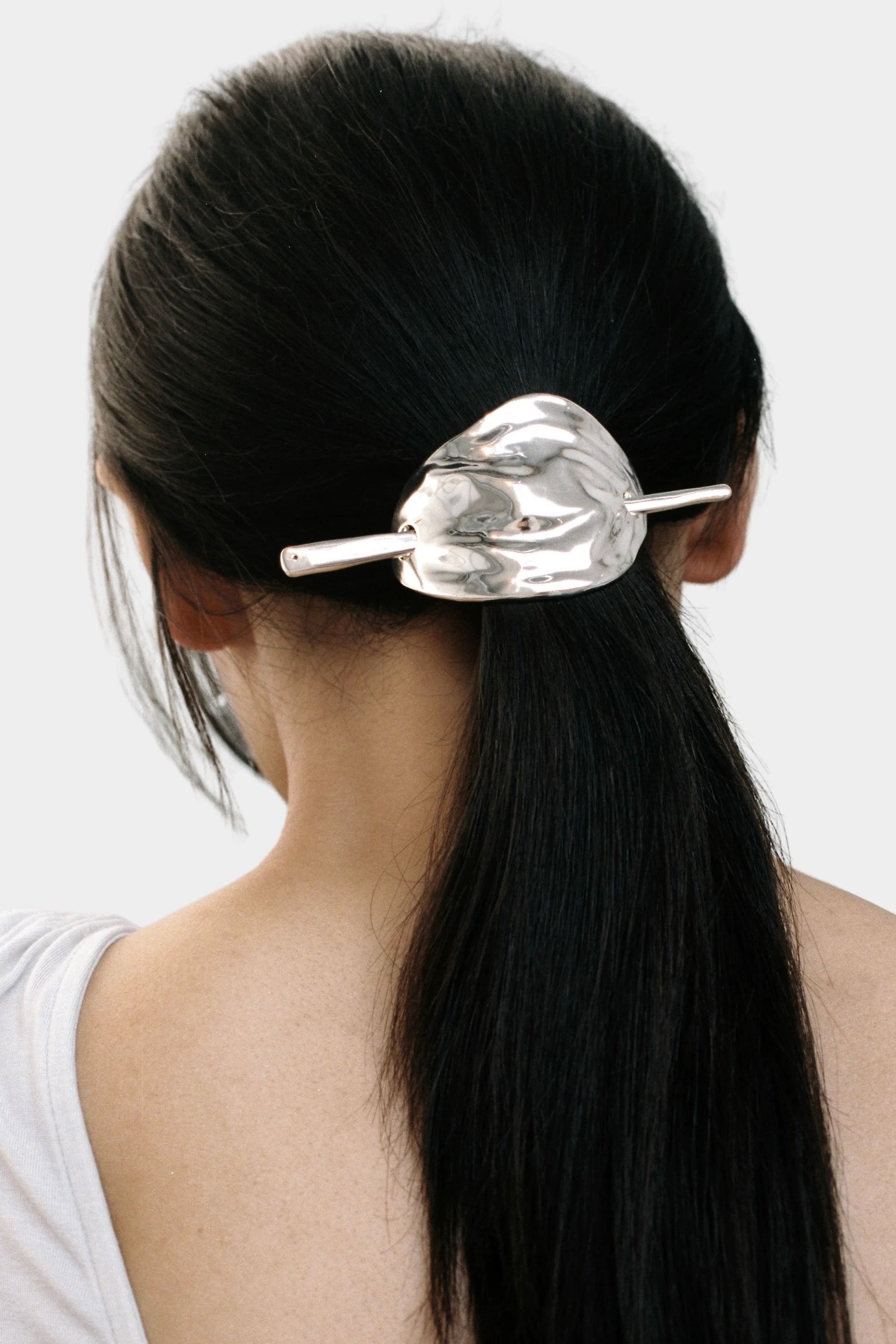 Wolf Circus Bean French Pin silver sculptural hair pin securing low ponytail
