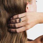 Bean Ring Sterling Silver Wolf Circus worn on hand close up sculptural silver ring