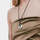 Wolf Circus Devon necklace silver worn long pendant necklace mid chest styling