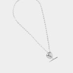 Wolf Circus Kaia necklace sterling silver curb chain toggle flat lay minimal background