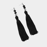 Miriam Earrings in sterling silver Wolf Circus angled flat lay black tassel earrings
