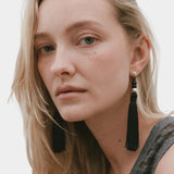 Miriam Earrings in sterling silver Wolf Circus worn portrait black tassel earrings