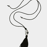 Miriam Necklace in silver Wolf Circus full necklace laid out adjustable black cord tassel pendant