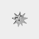Flat lay silver sculptural sun hair clip high polish finish
