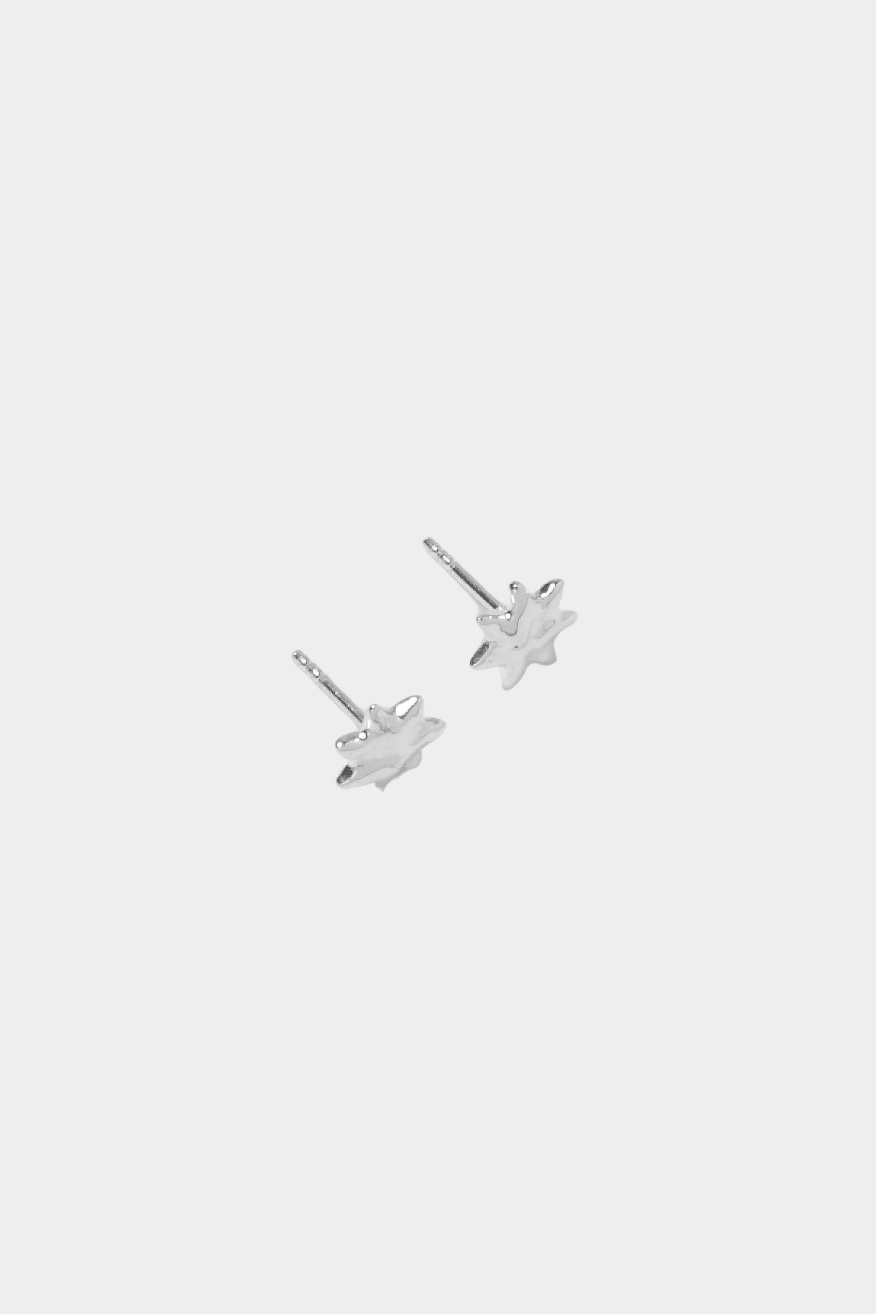Sun Stud Earrings Sterling Silver Wolf Circus flat lay silver sunburst stud earrings