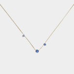 WWAKE Three-Step Necklace featuring three reclaimed blue sapphires asymmetrically set along a delicate 14k gold chain